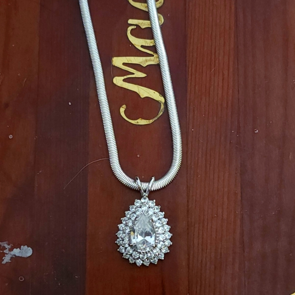 2 1/6 Pear Shape Moissanite & Diamond Halo Pendant Necklace